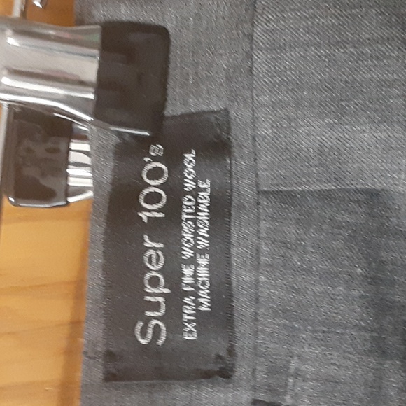 A grey pair of dress slacks made by dockers size 34/34 - Picture 2 of 6